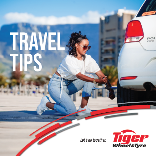 7997251938_TWT_Travel_Tips_PR_500x500 a woman changing a tyre